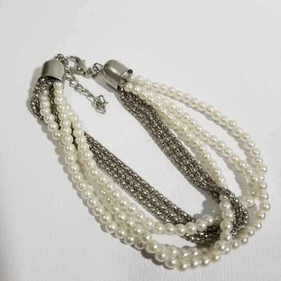 Two bracelets one copper colored bangle one multi chain faux - Picture 7 of 13